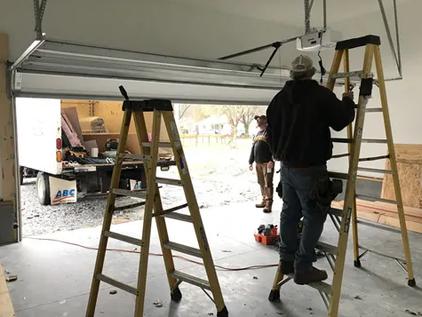 Alt Text: "Overhead garage door repair by experienced technicians at Jupiter FL Garage Door Repair Services.