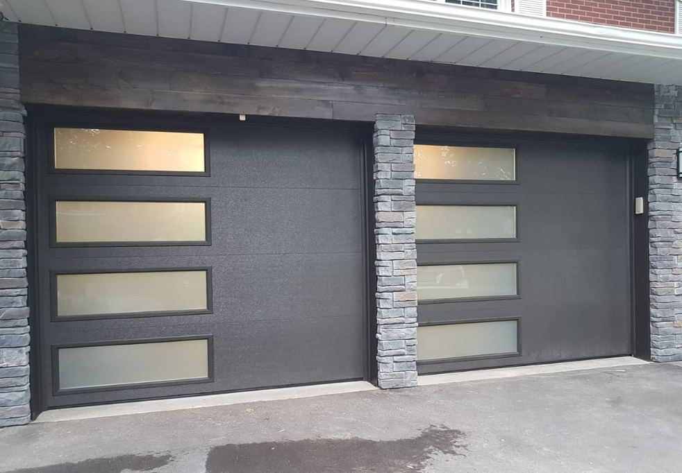 Professional technician performing garage door repair service in Jupiter, FL