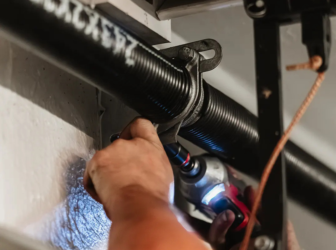 The Logistics of High-Lift Garage Door Spring Repair Conversions