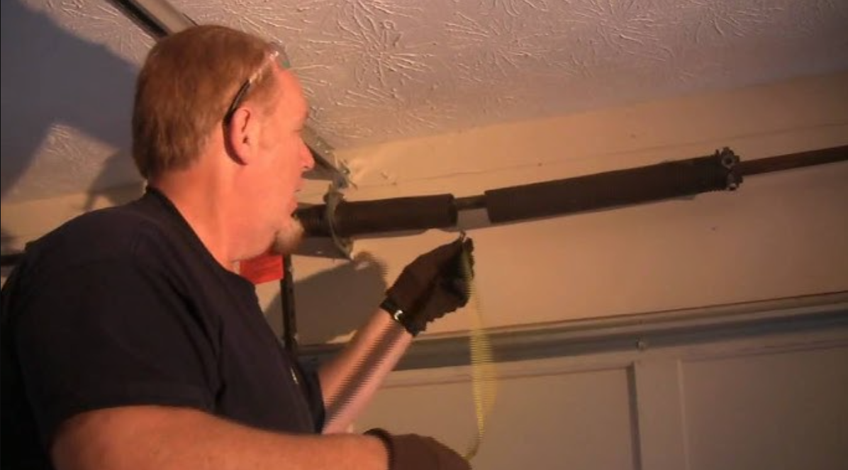 Why Professional Garage Door Spring Repair Prevents Track Misalignment