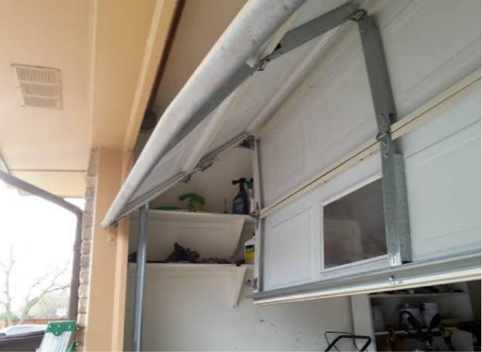 Off-Track Door Realignment Jupiter Inlet Colony