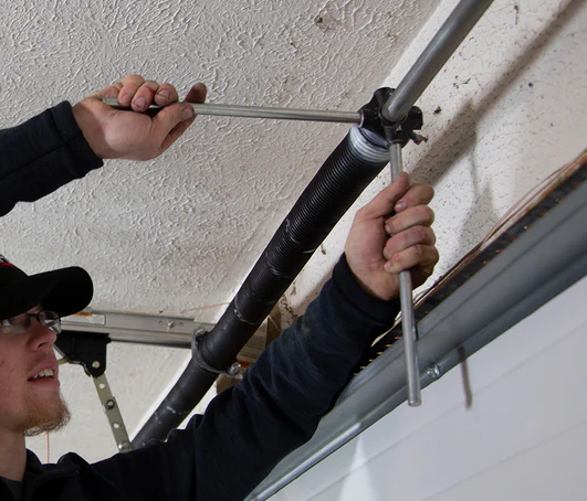 Professional garage door spring repair services in Jupiter, FL, ensuring safe and efficient operation of residential and commercial garage doors.